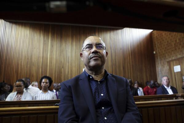 FILE - Former Mozambican finance minister, Manuel Chang, appears in court in Kempton Park, Johannesburg, South Africa, on Jan. 8, 2019. Chang faces imminent extradition to the U.S. to face corruption charges after spending four years in a South African prison. Chang was in 2018 arrested in South Africa on a U.S. warrant of arrest for charges related to his role in a $2 billion debt scandal that plunged Mozambique into a financial crisis when it was uncovered in 2016. (AP Photo/Phill Magakoe, File)