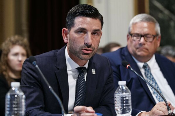 In this Oct. 29, 2019 photo, Department of Homeland Security Under Secretary Chad Wolf speaks during a meeting of the President's Interagency Task Force to Monitor and Combat Trafficking in Persons (PITF), in the Eisenhower Executive Office Building, on the White House complex in Washington. President Donald Trump has named Chad Wolf, the former chief of staff to Secretary Kirstjen Nielsen, to be the next Acting Homeland Security Secretary, the fifth person in the job since Trump took office. (AP Photo/Alex Brandon)