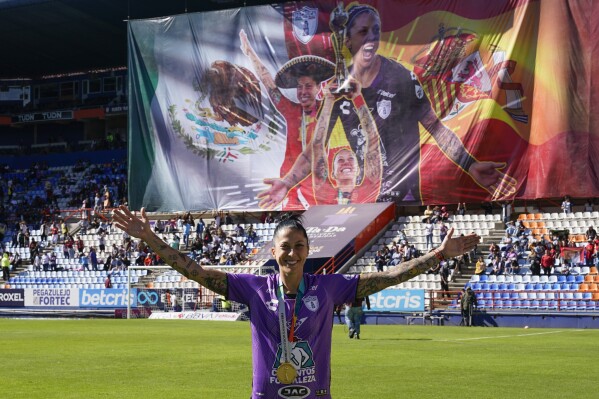 Pachuca's Jenni Hermoso smiles during a tribute before a Mexican Women's soccer league match between Pachuca and Pumas at the Miguel Hidalgo stadium in Pachuca, Mexico, Sunday, Sept. 10, 2023. (AP Photo/Eduardo Verdugo)