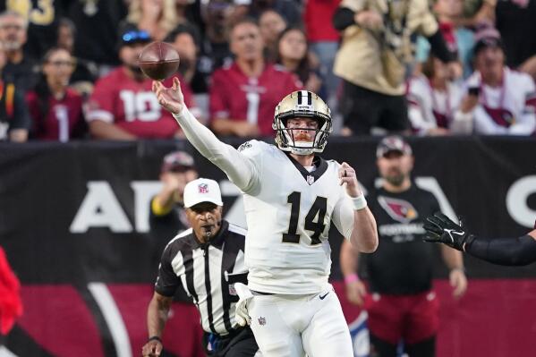 New Orleans Saints quarterback Andy Dalton (14) passes during the first half of an NFL football game against the Arizona Cardinals, Thursday, Oct. 20, 2022, in Glendale, Ariz. (AP Photo/Matt York)