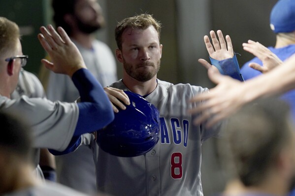 Jordan Wicks allows 2 hits and strikes out 9 in major league debut as Cubs top Pirates 10-6 | AP News