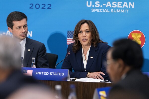 FILE - Vice President Kamala Harris, right, next to Transportation Secretary Pete Buttigieg, speaks during a plenary session of the US-ASEAN Summit, May 13, 2022, at the State Department in Washington. Harris is visiting Indonesia this week for the Association of Southeast Asian Nations summit. (AP Photo/Jacquelyn Martin, File)