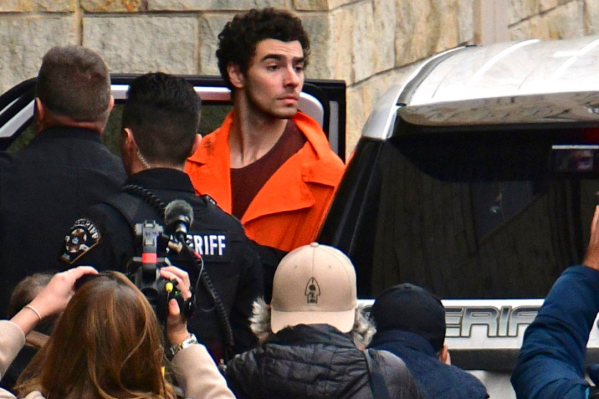 Suspect Luigi Mangione is taken into the Blair County Courthouse on Tuesday, Dec. 10, 2024, in Hollidaysburg, Pa. (Benjamin B. Braun/Pittsburgh Post-Gazette via AP)