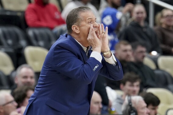 Kentucky coach John Calipari calls out to the team during the first half of a college basketball game against Oakland in the first round of the men's NCAA Tournament Thursday, March 21, 2024, in Pittsburgh. (AP Photo/Matt Freed)