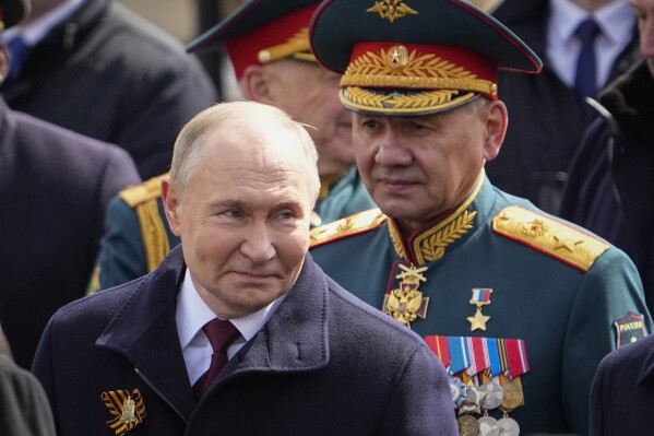 FILE - Russian President Vladimir Putin, left, and Russian Defense Minister Sergei Shoigu leave Red Square after the Victory Day military parade in Moscow, Russia, Thursday, May 9, 2024, marking the 79th anniversary of the end of World War II. Russian President Vladimir Putin has proposed removing Defense Minister Sergei Shoigu from his post. Putin nominated First Deputy Prime Minister Andrey Belousov for the role. (AP Photo/Alexander Zemlianichenko, File)
