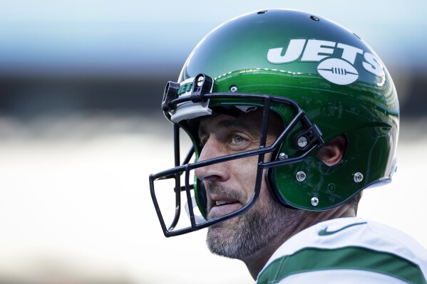New York Jets quarterback Aaron Rodgers practices before an NFL preseason football game against the New York Giants, Saturday, Aug. 26, 2023, in East Rutherford, N.J. (AP Photo/Adam Hunger)