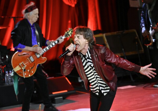 Mick Jagger, right, and Keith Richards of The Rolling Stones perform during a celebration for the release of their new album "Hackney Diamonds" on Thursday, Oct. 19, 2023, in New York. (Photo by Evan Agostini/Invision/AP)