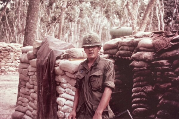 This photo provided by George Bennett shows Bennett during his service in Vietnam from 1966 to 1967. (George Bennett via AP)