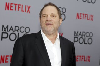 
              FILE - In this Dec. 2, 2014, Harvey Weinstein attends the season premiere of the Netflix series "Marco Polo" in New York. Weinstein faces multiple allegations of sexual abuse and harassment from some of the biggest names in Hollywood. (Photo by Andy Kropa/Invision/AP, File)
            
