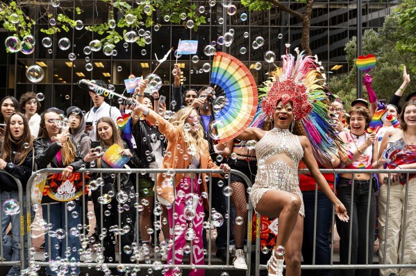Revelers celebrate during San Francisco's Pride Parade on Sunday, June 25, 2023. (AP Photo/Noah Berger)