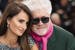 FILE - Actress Penelope Cruz, left, and director Pedro Almodovar pose for photographers at the photo call for the film "Pain and Glory" at the 72nd international film festival, Cannes, southern France, on May 18, 2019.  The Venice Film Festival is kicking off its 78th edition on Sept. 1, 2021, on the Lido with the premiere of Almodóvar’s “Madres Paralelas,” starring Cruz. (Photo by Arthur Mola/Invision/AP, File)