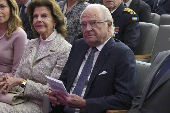 FILE - Sweden's King Carl XVI Gustaf and Queen Silvia sit during a visit to the King Hussein Cancer Center in Amman, Jordan, Nov 16, 2022. King Carl XVI Gustaf will undergo a planned a surgical procedure through a so-called peephole technique in the heart area. The palace said Tuesday, Feb. 14, 2023 that after the surgery, scheduled for Feb. 20, the 76-year-monarch will have a period of rest, meaning his planned commitments this month and in early March are being moved to later this spring. (AP Photo/Raad Adayleh, file)