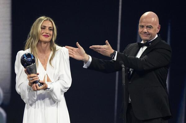 Spain's Alexia Putellas receives the Best FIFA Women's player award from FIFA president Gianni Infantino during the ceremony of the Best FIFA Football Awards in Paris, France, Monday, Feb. 27, 2023. (AP Photo/Michel Euler)