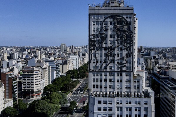 An iron statue depicting Argentina's former first lady María Eva Duarte de Perón, better known as Eva Perón or Evita, at the Ministry of Human Capital on Avenida 9 de Julio in Buenos Aires, Argentina, Tuesday, Feb. 13 Enhances the beauty of the front.  2024. (AP Photo/Natacha Pisarenko)