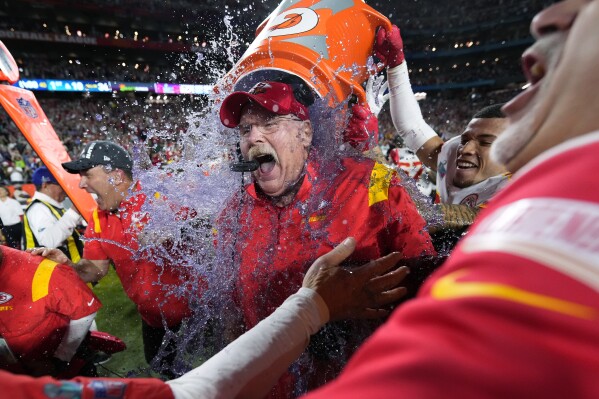 Kansas City Chiefs head coach Andy Reid is dunked after their win against the Philadelphia Eagles at the NFL Super Bowl 57 football game, Sunday, Feb. 12, 2023, in Glendale, Ariz. Kansas City Chiefs defeated the Philadelphia Eagles 38-35. (AP Photo/Matt Slocum)