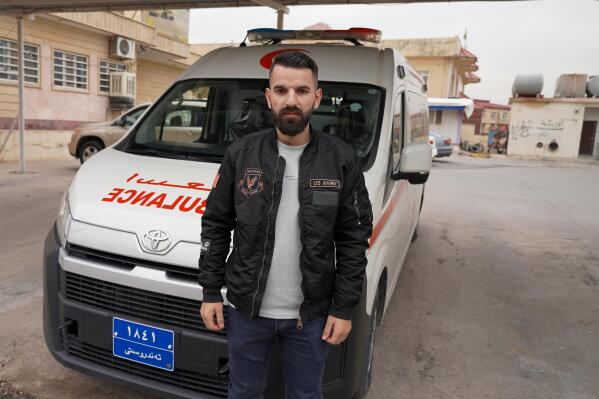 Zaid Ramadan, who recently returned from Minsk with his pregnant wife Delin, after they were caught by Polish authorities, poses for a picture in Dahuk, Iraq, Saturday, Nov. 20, 2021. The couple were among a disproportionate number of Iraqi migrants, most of them from Iraq’s Kurdish region, who chose to sell their homes, cars and other belongings to pay off smugglers with the hope of reaching the European Union from the Belarusian capital of Minsk — a curious statistic for an oil-rich region seen as the most stable in all of Iraq. (AP Photo/Rashid Yahya)