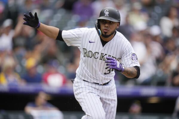 Rockies use 5-run 8th to surge to sweep over Brewers
