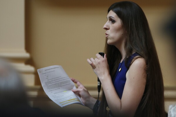 FILE - Del. Danica Roem, D-Prince William, speaks during the House session at the Capitol in Richmond, Va., April 3, 2019. Roem is accustomed to opponents using her transgender identity as a cudgel in Virginia legislative races. After two comfortable reelection wins in Virginia's House of Delegates, Roem won a seat in the state Senate. That helped Democrats get a legislative lock in Virginia, complicating Republican Gov. Glenn Youngkin’s social conservative agenda. (AP Photo/Steve Helber, File)