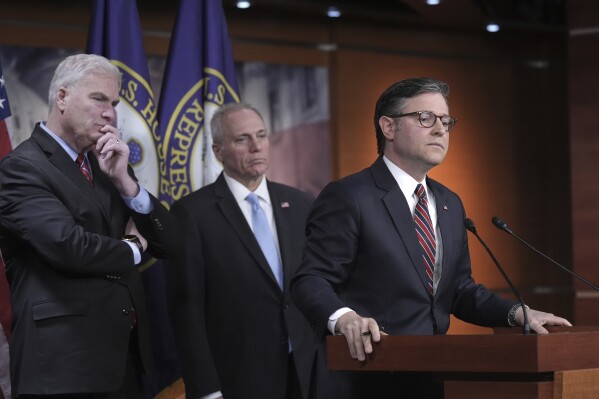 Speaker of the House Mike Johnson, joined from left by House Majority Whip Tom Emmer, R-Minn., and House Majority Leader Steve Scalise, talks to reporters about his push for a House-Senate compromise budget resolution to advance President Donald Trump's agenda, April 8, 2025. (AP Photo/J. Scott Applewhite, File)
