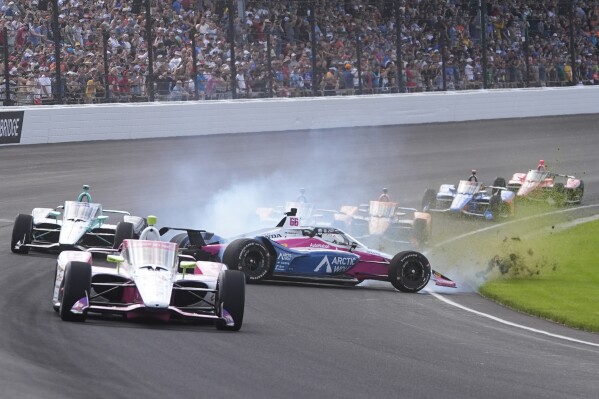 Tom Blomqvist (66), of England, wrecks during the Indianapolis 500 auto race at Indianapolis Motor Speedway, Sunday, May 26, 2024, in Indianapolis. (AP Photo/Darron Cummings)