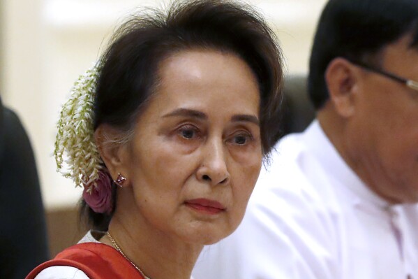 FILE - Myanmar's leader Aung San Suu Kyi, left, attends the bilateral meeting with Chinese President Xi Jinping at the president house in Naypyitaw Myanmar, on Jan. 18, 2020. Myanmar’s military-controlled government plans to transfer the country’s ousted leader Aung San Suu Kyi from a prison in the capital Naypyitaw to home confinement as part of an act of clemency to be granted prisoners in connection with a religious ceremony on Aug. 1, a security official said Tuesday July 25, 2023. (Nyein Chan Naing/Pool Photo via AP, File)