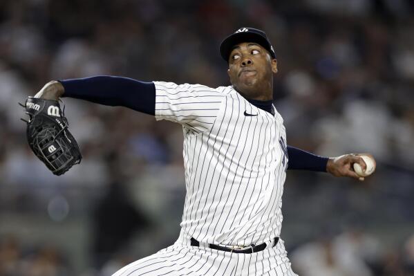 New York Yankees pitcher Aroldis Chapman throws during the ninth inning of the team's baseball game against the Toronto Blue Jays on Friday, Aug. 19, 2022, in New York. The Blue Jays won 4-0. (AP Photo/Adam Hunger)