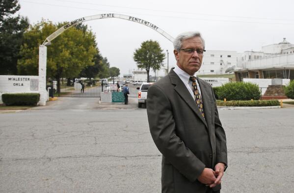 Don Knight, attorney for death row inmate Richard Glossip, waits to enter the grounds of the State Penitentiary in McAlester, Okla, for the scheduled execution of Glossip. Wednesday, Sept. 30, 2015. Glossip was convicted of ordering the 1997 killing of Barry Van Treese, who owned the Oklahoma City motel that Glossip managed. (AP Photo/Sue Ogrocki)