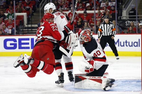 Carolina Hurricanes defenseman Brent Burns (8) celebrates with Frederik  Andersen (31) after the Hurricanes defeated the New Jersey Devils in Game 4  of an NHL hockey Stanley Cup second-round playoff series Tuesday