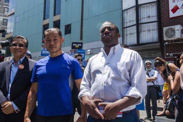 FILE - New York State Senator Brian Benjamin, right, and State Senator John Liu, second from left, attend the "Voting is Justice Rally," on June 20, 2021, in New York. Gov. Kathy Hochul has chosen Benjamin, a Democrat from Harlem, to be her lieutenant governor. (AP Photo/Brittainy Newman, File)