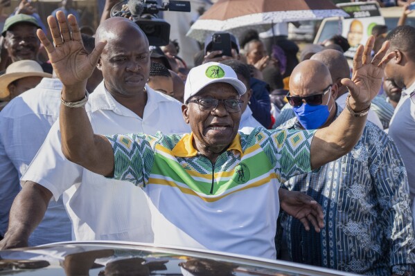 FILE - Former president of the A.N.C. and South Africa, Jacob Zuma, waves to supporters after casting his ballot in Nkandla, Kwazulu Natal, South Africa, Wednesday, May 29, 2024 during the general elections. Former South African President Jacob Zuma was expected to face a disciplinary hearing with the African National Congress party, after campaigning against the organization he once led as head of a new political party in national elections in May. Wednesday's hearing could lead to Zuma, 82, being expelled from the ANC. (AP Photo/Emilio Morenatti, File)