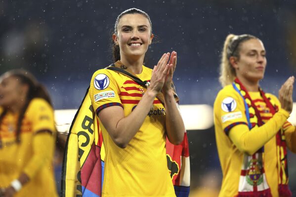 Barcelona's Ingrid Engen, center, applauds after the Women's Champions League, semi final second leg, soccer match between FC Chelsea and FC Barcelona in London, England, Saturday, April 27, 2024. (Kieran Cleeves/PA via Ǻ)