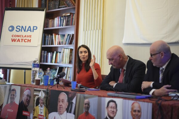 Survivors Network of those Abused by Priests activists, from left, Sarah Pearson, Peter Isely and President Shaun Dougherty talk to reporters during a press conference in Rome, March 25, 2025. (AP Photo/Andrew Medichini, File)