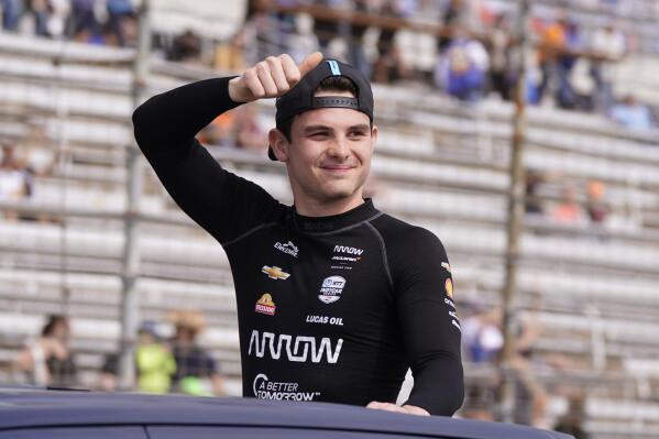 FILE - Pato O'Ward of Mexico waves during introductions for the IndyCar auto race at Texas Motor Speedway in Fort Worth, Texas, Sunday, April 2, 2023. A win on Sunday would be the first for O'Ward at Long Beach and this season, which he's opened with consecutive second-place finishes. (AP Photo/LM Otero, File)