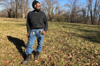 FILE - In this Jan. 28, 2021, file photo, Clyde Robinson, 80, speaks with a reporter while standing on his acre-sized parcel of land, in Memphis, Tenn. Robinson has been fighting an effort by two companies seeking a piece of his land to build part of an oil pipeline that would run through the Memphis area into north Mississippi. City council members in Memphis, Tenn., delayed a vote Tuesday, May 4, on a law that could make it more difficult for a company to build an oil pipeline over an aquifer that provides clean drinking water to 1 million people. The pipeline company also agreed to halt eminent domain lawsuits against property owners like Robinson (AP Photo/Adrian Sainz, File)