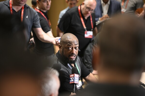 Pittsburgh Steelers head coach Mike Tomlin talks with reporters during an AFC coaches availability at the NFL owners meetings, Monday, March 25, 2024, in Orlando, Fla. (AP Photo/Phelan M. Ebenhack)