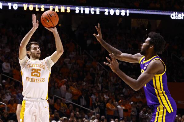Tennessee guard Santiago Vescovi (25) shoots over LSU center Efton Reid (15) during the first half of an NCAA college basketball game Saturday, Jan. 22, 2022, in Knoxville, Tenn. (AP Photo/Wade Payne)