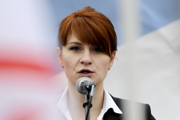 
              FILE - In this April 21, 2013 file photo, Maria Butina, leader of a pro-gun organization in Russia, speaks to a crowd during a rally in support of legalizing the possession of handguns in Moscow, Russia. Prosecutors say they have “resolved” a case against Butina accused of being a secret agent for the Russian government, a sign that she likely has taken a plea deal. The information was included in a court filing Monday.   (AP Photo/File)
            