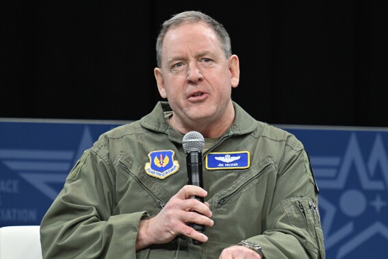 In this photo provided by the U.S. Air Force, Gen. James Hecker, commander of U.S. Air Forces in Europe, speaks at the Air and Space Forces Association 2023 Warfare Symposium in Aurora, Colo., March 8, 2023. The U.S. is making precautionary plans to evacuate two key drone and counter-terror bases in Niger if that becomes necessary under the West African nation’s new ruling junta. That word came Friday from the Air Force commander for Africa, Gen. James Hecker. (Eric Dietrich/U.S. Air Force via AP)