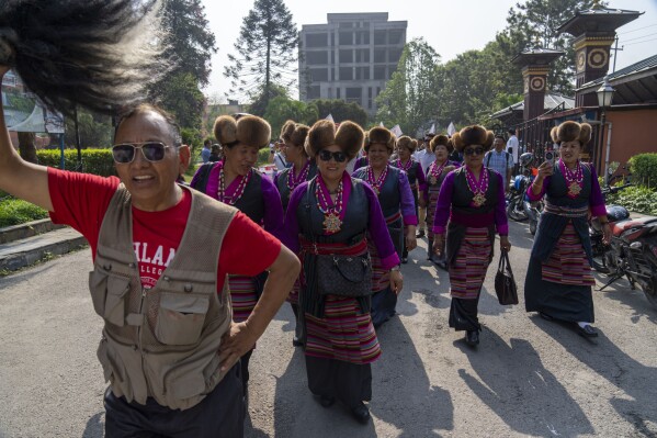 People from the mountaineering community participate in a rally to mark the anniversary of the first ascent of Mount Everest in Kathmandu, Nepal, Wednesday, May 29, 2024. (AP Photo/Niranjan Shrestha)