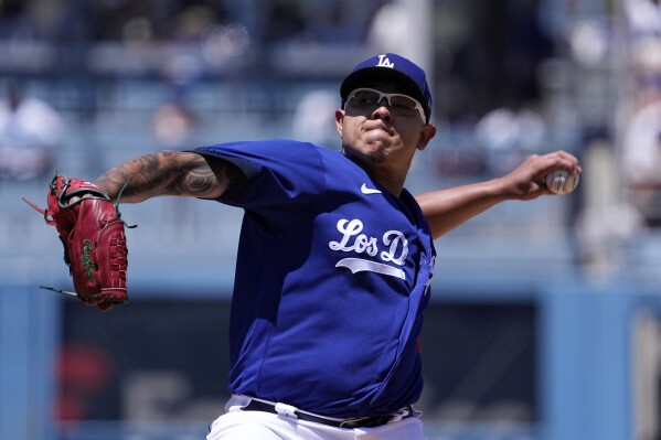 Los Angeles Dodgers starting pitcher Julio Urias throws to the plate during the second inning of a baseball game against the Colorado Rockies Sunday, Aug. 13, 2023, in Los Angeles. (AP Photo/Mark J. Terrill)