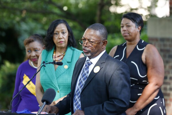 FILE - NAACP Virginia President Robert N. Barnette Jr. speaks near the Virginia Capitol, July 18, 2023, in Richmond, Va. From left, Denise Harrington, Gaylene Kanoyton, Barnette and Karen Jones attended the news conference. The Virginia NAACP said Monday, Nov. 6, that Gov. Glenn Youngkin's administration lacks clear standards for how it restores voting rights for convicted felons who served their sentences, leaving many frustrated and unable to vote in the nationally watched state elections on Tuesday, Nov. 7. (Daniel Sangjib Min/Richmond Times-Dispatch via AP, File)