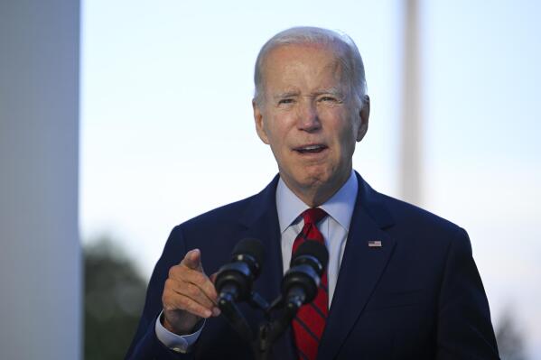 President Joe Biden speaks from the Blue Room Balcony of the White House Monday, Aug. 1, 2022, in Washington, as he announces that a U.S. airstrike killed al-Qaida leader Ayman al-Zawahri in Afghanistan. (Jim Watson/Pool via AP)