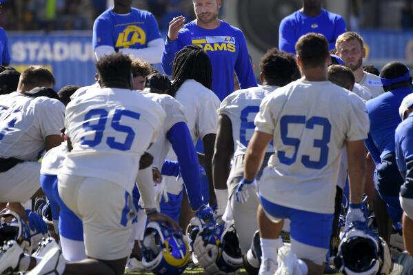 Los Angeles Rams coach Sean McVay talks to players during NFL football training camp Friday, Aug 6, 2021, in Irvine, Calif. (AP Photo/John McCoy)
