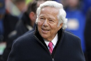 
              FILE - In this Jan. 20, 2019, file photo, New England Patriots owner Robert Kraft walks on the field before the AFC Championship NFL football game in Kansas City, Mo. Florida prosecutors have offered a plea deal to Kraft and other men charged with paying for illicit sex at a massage parlor. The Palm Beach State Attorney confirmed Tuesday, March 19, 2019, it has offered Kraft and 24 other men charged with soliciting prostitution the standard diversion program offered to first-time offenders.  (AP Photo/Charlie Neibergall, File)
            