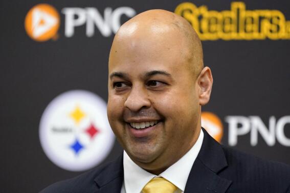 Omar Khan, the new general manager of the Pittsburgh Steelers, meets with reporters at the NFL football team's training facility in Pittsburgh, Friday, May 27, 2022. (AP Photo/Gene J. Puskar)