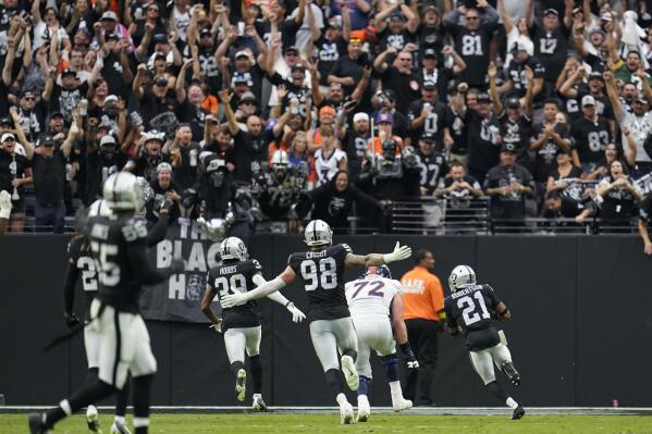 Jacobs carries Raiders to 1st win under McDaniels