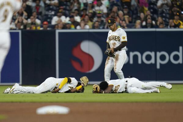 Padres' Profar collapses after collision, taken off on cart