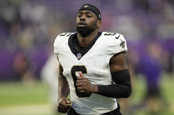 FILE - New Orleans Saints safety Marcus Maye jogs off the field after an NFL football game against the Minnesota Vikings, Nov. 12, 2023, in Minneapolis. The Miami Dolphins agreed to sign Maye on Monday, June 10, 2024, a person with knowledge of the negotiations told The Associated Press. The person spoke to the AP on condition of anonymity because the deal had not been announced. (AP Photo/Abbie Parr, File)