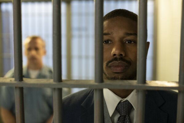 This image released by Warner Bros Pictures shows Michael B. Jordan in a scene from "Just Mercy." (Jake Netter/Warner Bros. Pictures via AP)