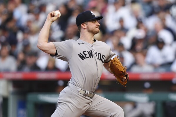 New York Yankees pitcher Clarke Schmidt delivers to a Los Angeles Angels batter during the first inning of a baseball game in Anaheim, Calif., Wednesday, May 28, 2025. (AP Photo/Jessie Alcheh)